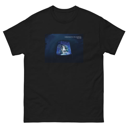 Rockets burst from the Streetlamps Memorial Blue Light T-shirt